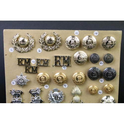 32 - A collection of mainly Staybrite British military buttons and badges to include The Royal Marines, R... 