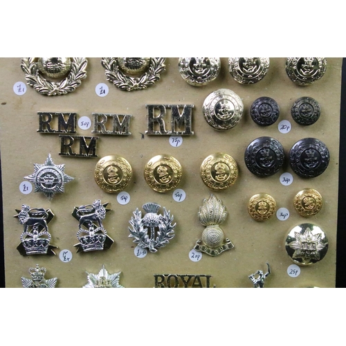 32 - A collection of mainly Staybrite British military buttons and badges to include The Royal Marines, R... 