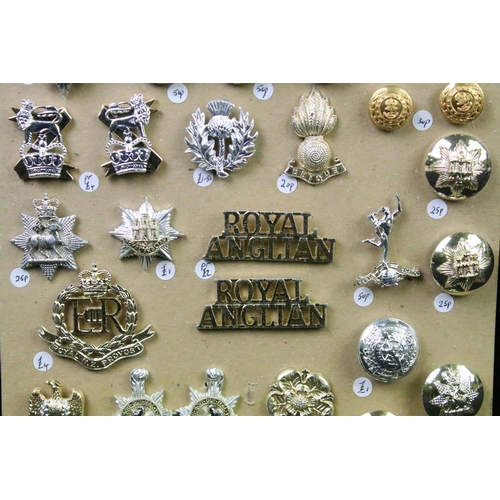 32 - A collection of mainly Staybrite British military buttons and badges to include The Royal Marines, R... 