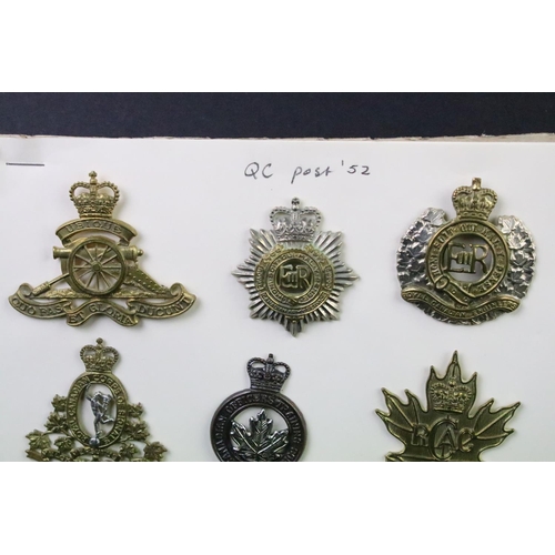 35 - A collection of Canadian Military Queens crown cap badges to include The Canadian Officers Training ... 