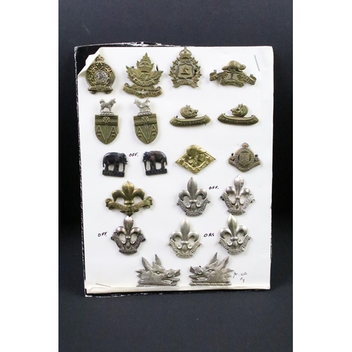 36 - A collection of Canadian military collar badges to include World War Two King Crown issues, brass, b... 