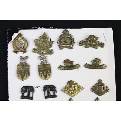 36 - A collection of Canadian military collar badges to include World War Two King Crown issues, brass, b... 