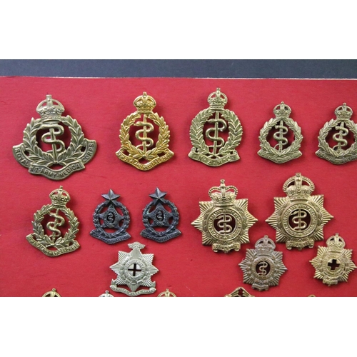 37 - A collection of Commonwealth Royal Army Medical Corps cap and collar badges to include Canadian, Aus... 