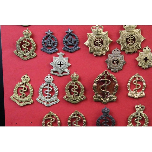 37 - A collection of Commonwealth Royal Army Medical Corps cap and collar badges to include Canadian, Aus... 