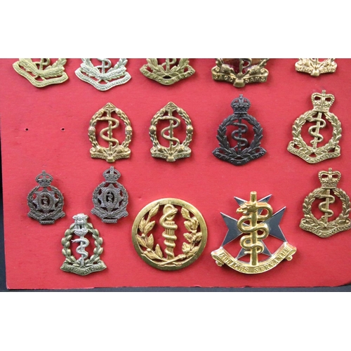 37 - A collection of Commonwealth Royal Army Medical Corps cap and collar badges to include Canadian, Aus... 