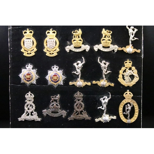 41 - A collection of British military regimental cap and collar badges to include the Army Service Corps,... 