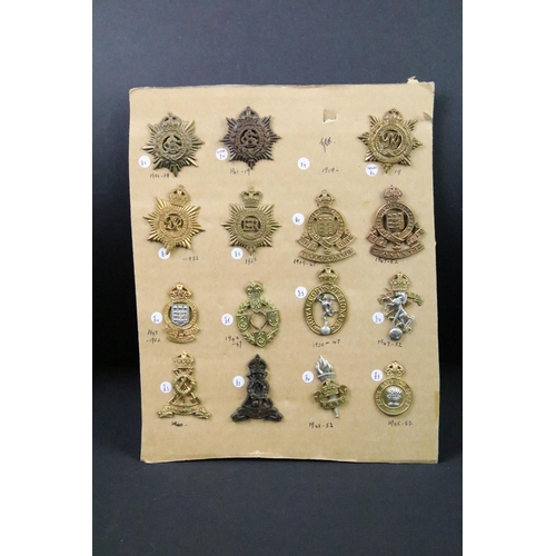 41 - A collection of British military regimental cap and collar badges to include the Army Service Corps,... 