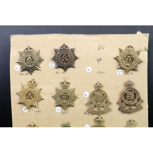 41 - A collection of British military regimental cap and collar badges to include the Army Service Corps,... 