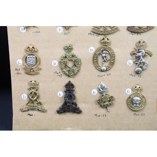 41 - A collection of British military regimental cap and collar badges to include the Army Service Corps,... 