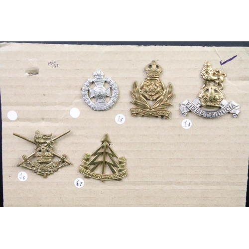 42 - A collection of British military regimental cap and collar badges to include the  King Somerset Ligh... 