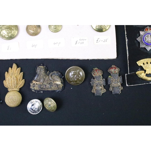 52 - A collection of British Military Cloth badges, trade badges, shoulder titles, buttons and sweetheart... 