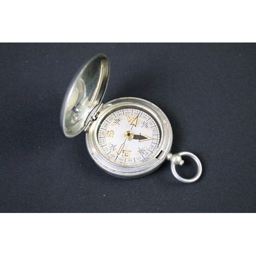 54 - A British military issued World War One pocket marching compass, the case marked Dennison, Birmingha... 