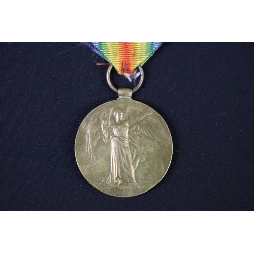 61 - A British World war One full size medal pair to include the 1914-1918 British war medal and the Vict... 