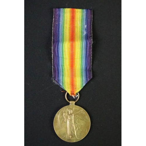 61 - A British World war One full size medal pair to include the 1914-1918 British war medal and the Vict... 