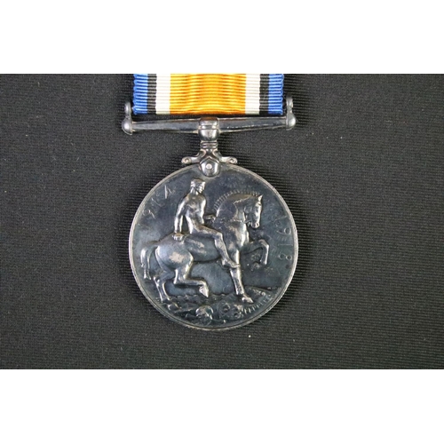 61 - A British World war One full size medal pair to include the 1914-1918 British war medal and the Vict... 