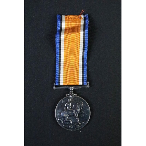 61 - A British World war One full size medal pair to include the 1914-1918 British war medal and the Vict... 