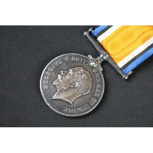 61 - A British World war One full size medal pair to include the 1914-1918 British war medal and the Vict... 