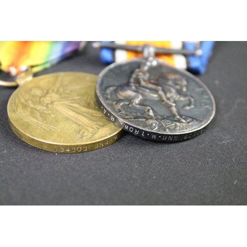 61 - A British World war One full size medal pair to include the 1914-1918 British war medal and the Vict... 