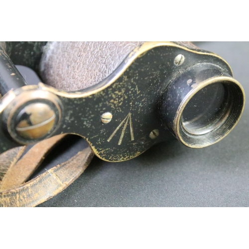 66 - A pair of British military issued binoculars by Ross of London, marked with the British broad arrow.