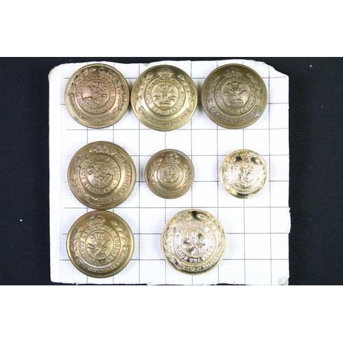 74 - A collection of British and Commonwealth regimental buttons to include King Crown and Queens Crown e... 