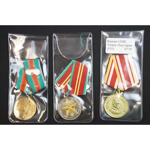 83 - A collection of Russian / CCCP military and Civilian medals to include world war two examples.