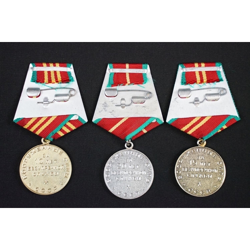 83 - A collection of Russian / CCCP military and Civilian medals to include world war two examples.