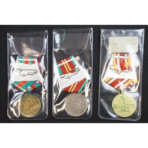 83 - A collection of Russian / CCCP military and Civilian medals to include world war two examples.