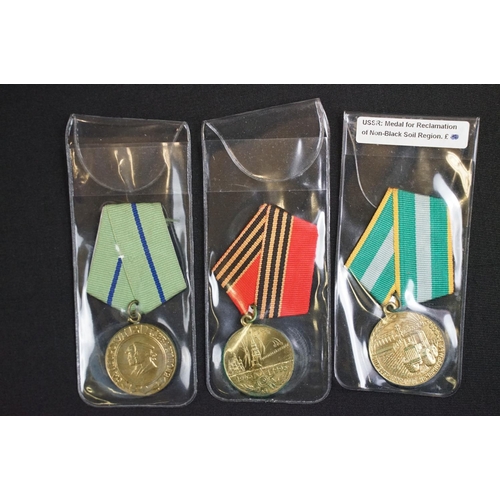 83 - A collection of Russian / CCCP military and Civilian medals to include world war two examples.