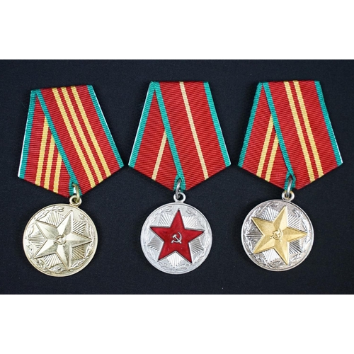 83 - A collection of Russian / CCCP military and Civilian medals to include world war two examples.