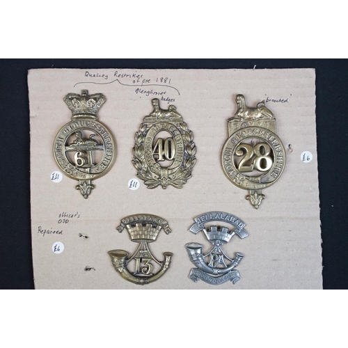 87 - A collection of mainly British military cap and collar badges, mainly King Crown and including offic... 