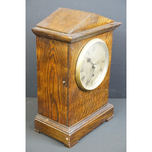 122 - A World War Two wooden cased chiming mantle clock, the face etched with the badge of the RAF / Royal... 