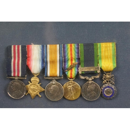 136 - Two British WW1 / WW2 miniature medal group to include a World War One Military Medal group and a Wo... 