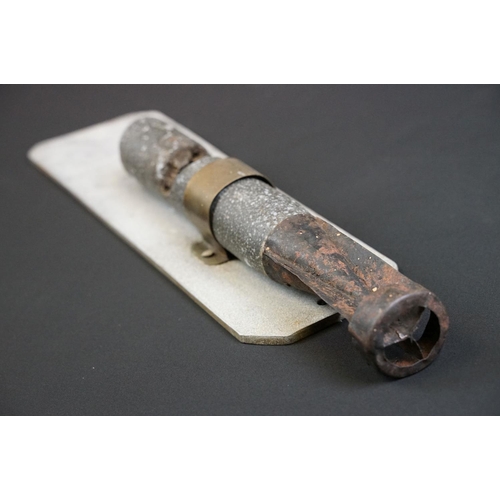 158 - A World War Two German spent Incendiary bomb mounted to hand made aluminium plaque, purportedly drop... 