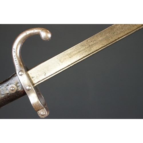 175 - A French 1868 Grass Bayonet together with scabbard.