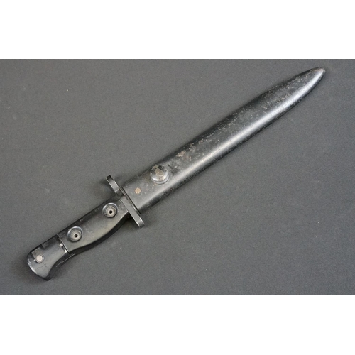 180 - A British L.1.A.4. SLR Rifle bayonet complete with scabbard.