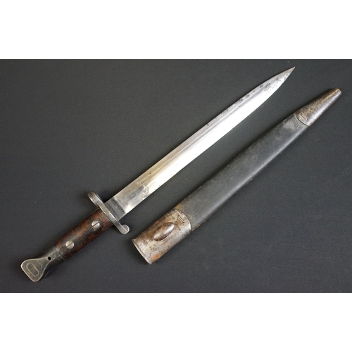 182 - A British WW1 Model 1888 Wilkinson Bayonet with leather scabbard
