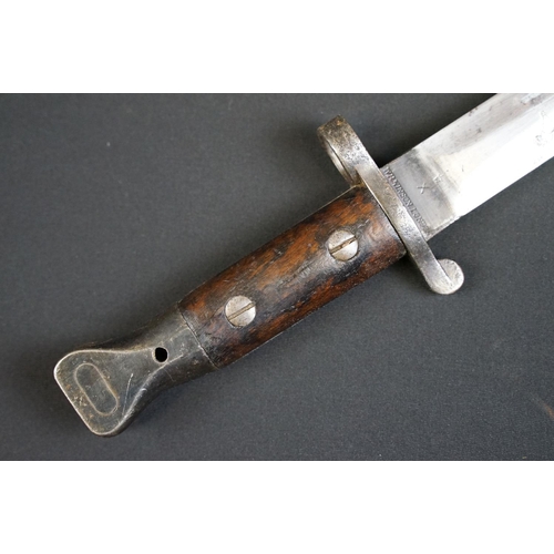 182 - A British WW1 Model 1888 Wilkinson Bayonet with leather scabbard