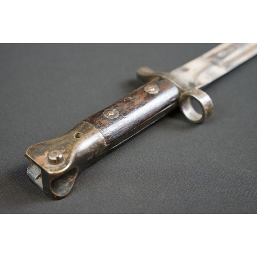 182 - A British WW1 Model 1888 Wilkinson Bayonet with leather scabbard