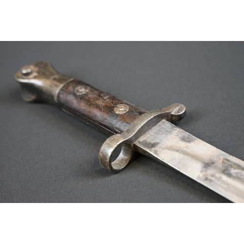 A British Ww1 Model 1888 Wilkinson Bayonet With Leather Scabbard