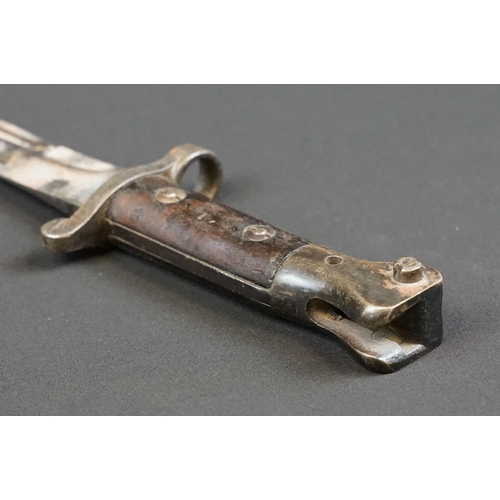 182 - A British WW1 Model 1888 Wilkinson Bayonet with leather scabbard