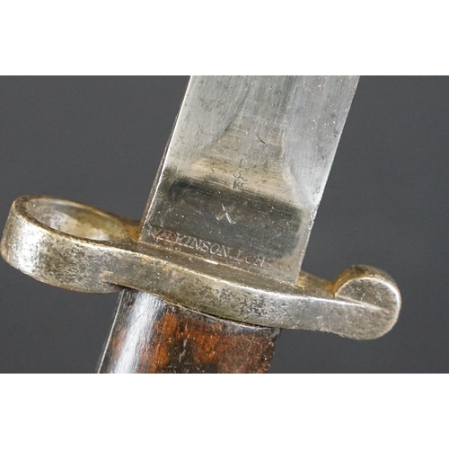 182 - A British WW1 Model 1888 Wilkinson Bayonet with leather scabbard