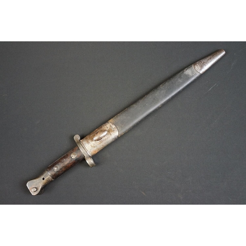 182 - A British WW1 Model 1888 Wilkinson Bayonet with leather scabbard