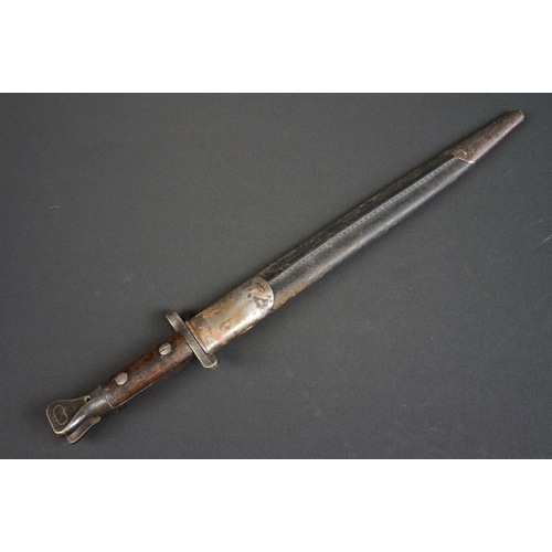 182 - A British WW1 Model 1888 Wilkinson Bayonet with leather scabbard
