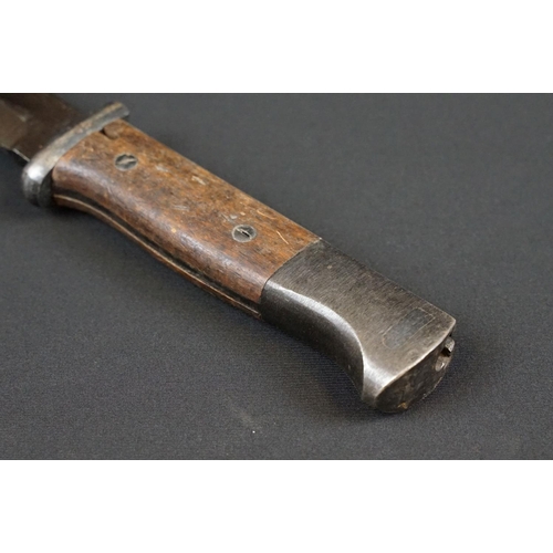 191 - A Mauser K98 Bayonet With Wooden Grip And 1944 dated scabbard