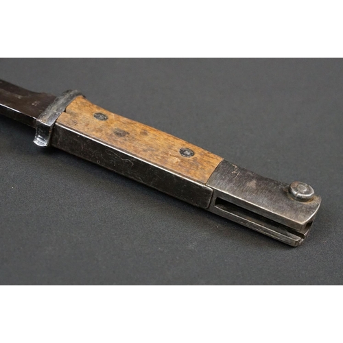 191 - A Mauser K98 Bayonet With Wooden Grip And 1944 dated scabbard