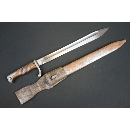 193 - A German Waffenfabrik Mauser Bayonet together with scabbard and frog.