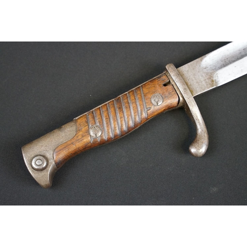 193 - A German Waffenfabrik Mauser Bayonet together with scabbard and frog.