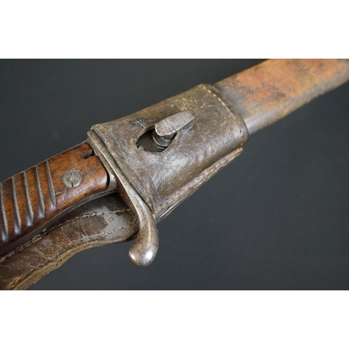 193 - A German Waffenfabrik Mauser Bayonet together with scabbard and frog.