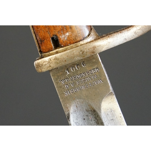 193 - A German Waffenfabrik Mauser Bayonet together with scabbard and frog.