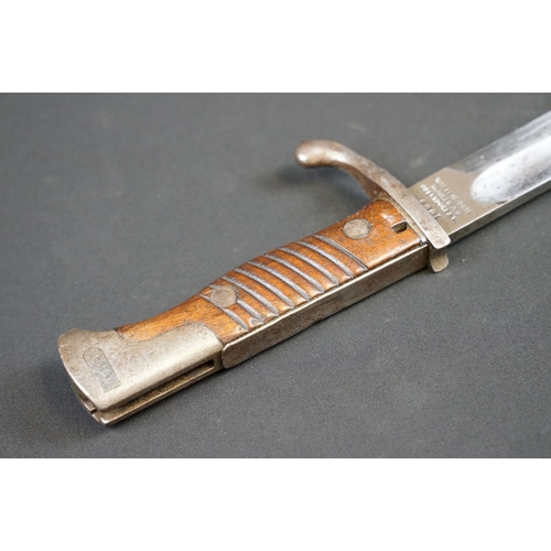 193 - A German Waffenfabrik Mauser Bayonet together with scabbard and frog.